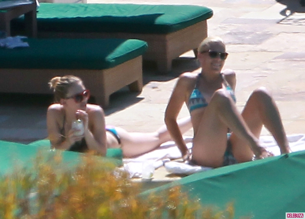 Scarlett Johansson and Busy Phillips - Bikini candids at a pool in Montecito